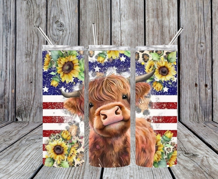 cow sunflowers and flag