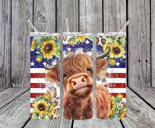 cow sunflowers and flag