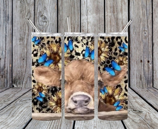 COW WITH BLUE BUTTERFLYS